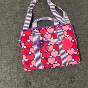 Someday" by Justin Bieber heart-patterned laptop bag.
